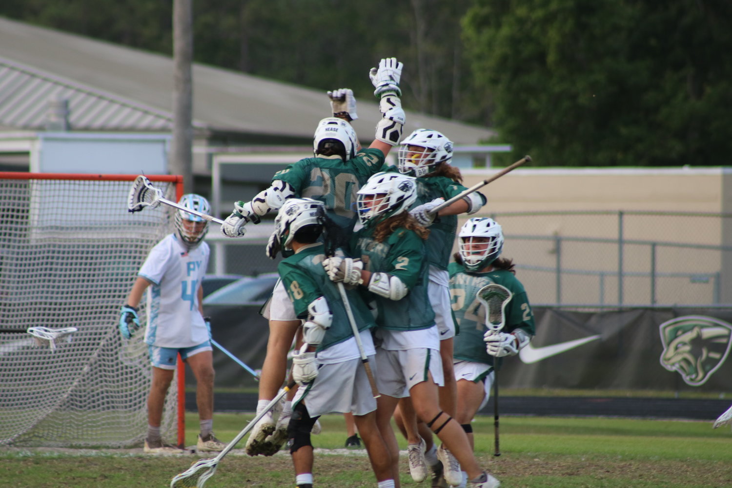 The Nease Panthers celebrate one of their six second half goals.